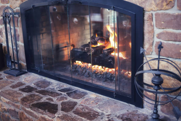 istock A glowing fire in the stone fireplace to warm a chilly day 1195483094