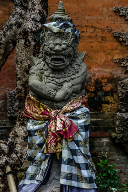 istock Balinese guardian wrapped in poleng cloth 1195487387