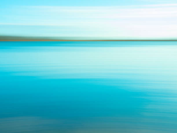 istock Calming blue motion blur ocean background 1195488105