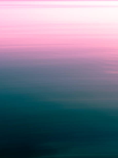 istock Tranquil pink to blue gradient blurred motion seawater 1195491046