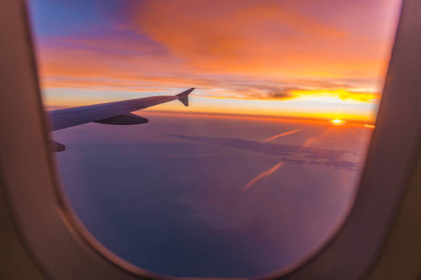 istock Amazing sunset from the airplane window over Qatar 1195493783