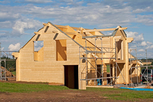 wooden house under construction. family build home stock photo