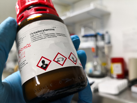 Warning symbols on the label of a chemical. Toxicity, pollution, corrosion. Example of a chemistry called octadecylamine.