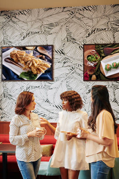 istock Women discussing creative business ideas 1195506119