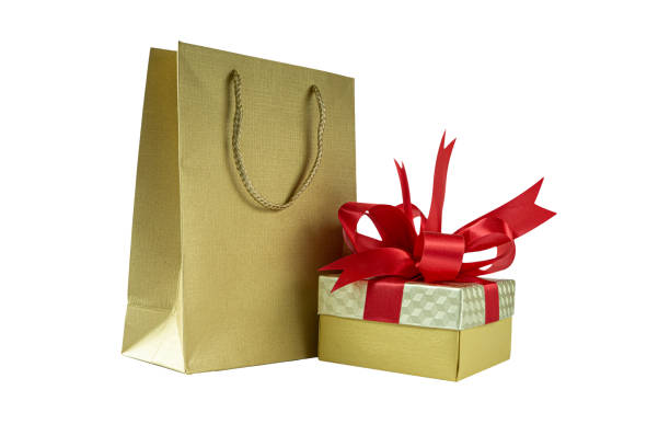 Shopping bag and gift box with red ribbon , Isolated on white background