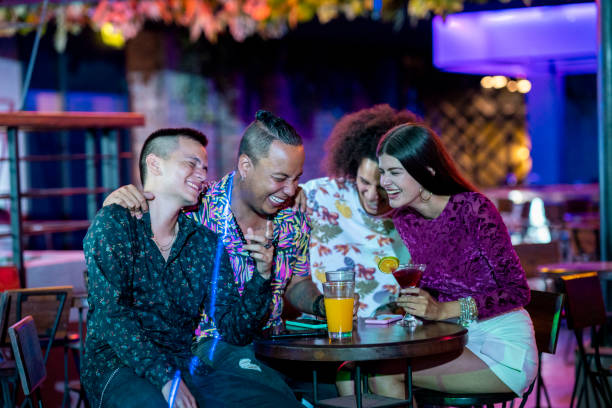 istock Friends chatting and laughing at the disco 1195513341