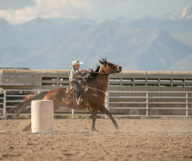 istock Young cowboy barrel racing rodeo 1195514274