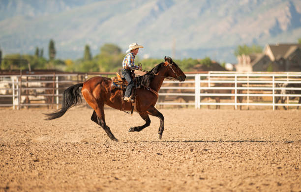 istock Young cowboy barrel racing rodeo 1195514334