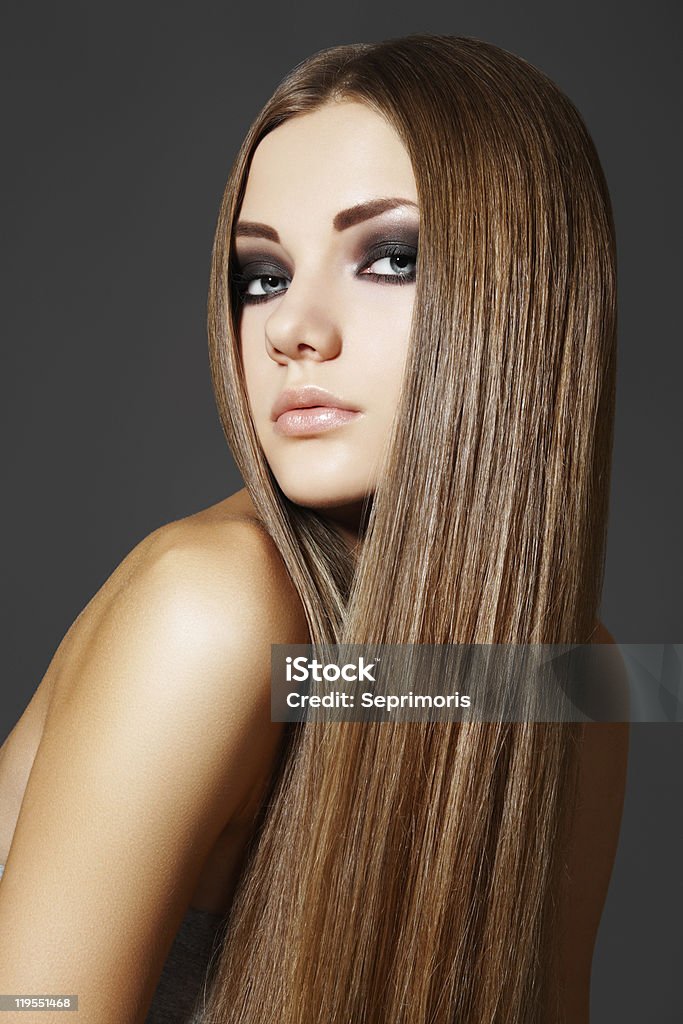 Portrait of woman model with shiny long brown hair  Perfection Stock Photo