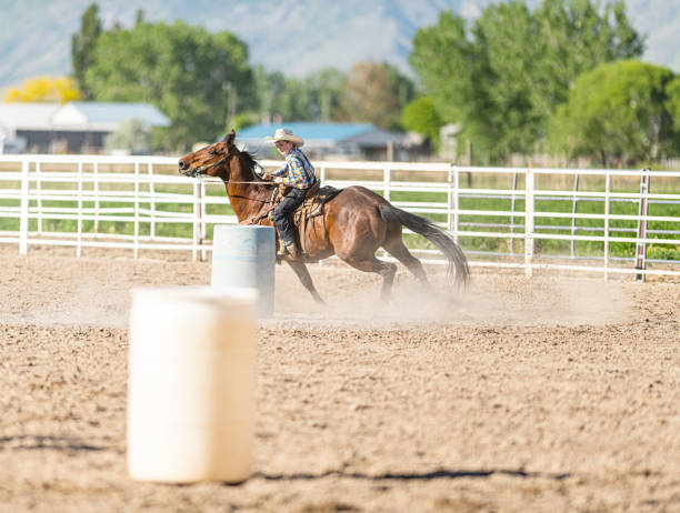 istock Young cowboy barrel racing rodeo 1195515925