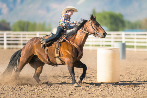 istock Young cowboy barrel racing rodeo 1195516011
