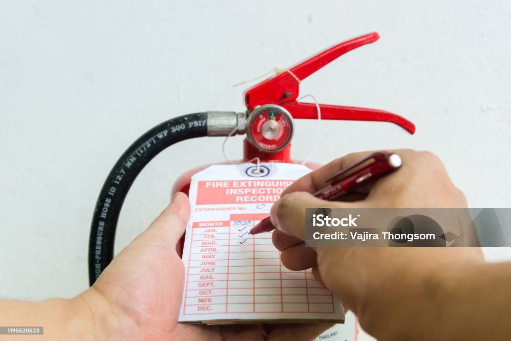 Fire extinguisher monthly check list Fire Extinguisher Stock Photo