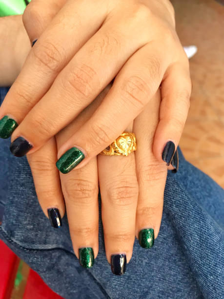 istock Women's hands with clean manicure and beautiful 1195524434