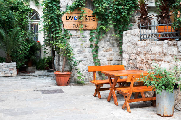 Cafe on the street in Old Town in Kotor, Montenegro. Famous travel destination.