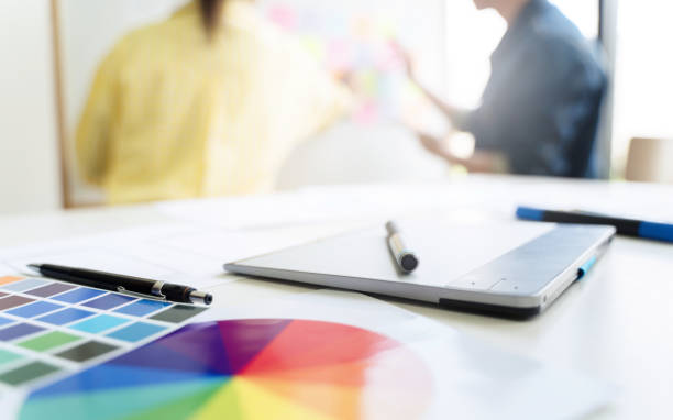 istock Graphic Designer artist discussing in project together. 1195525460