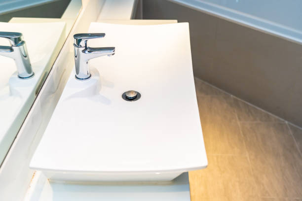 istock Water facuet and white sink decoration interior 1195528165