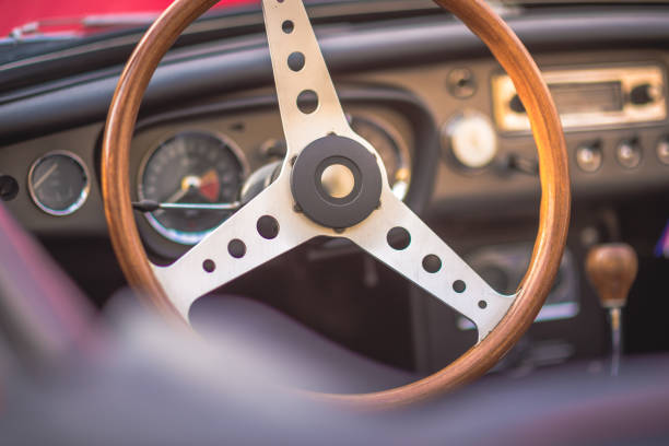 classic vintage car interior, close up on steering wheel, dasboard, retro effect - collectors car dashboard odometer mode of transport imagens e fotografias de stock