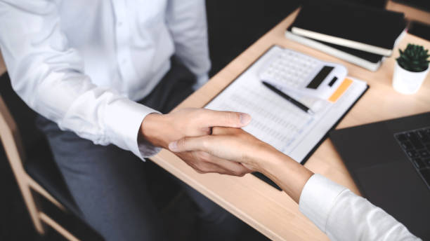 istock Business partnership hand shaking successful commerce dealing. 1195529371
