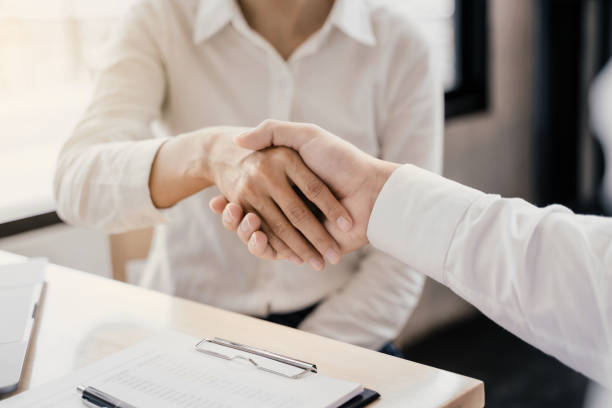 istock Business partnership hand shaking successful commerce dealing. 1195532492