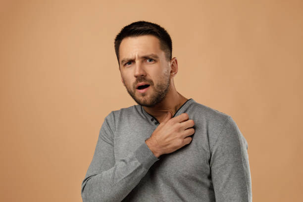 istock surprised amazed handsome bearded man with shocked facial expression 1195533007
