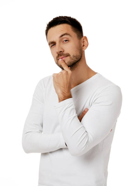 istock bearded man in casual white shirt asking questions 1195533049