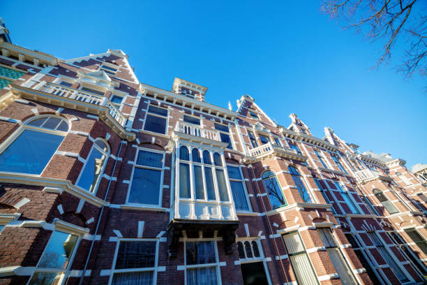 Typical facade of a Dutch style buildings in Amsterdam Netherlands
