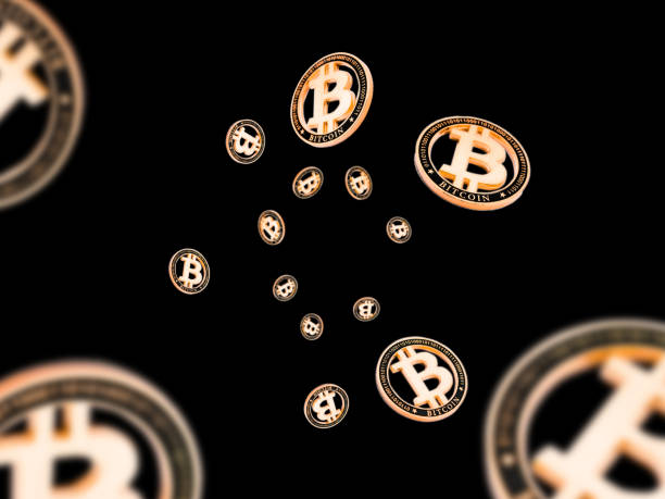 istock Litecoin. Gold Falling Bitcoins on black. Cryptocurrency golden concept. Falling background. 1195538721