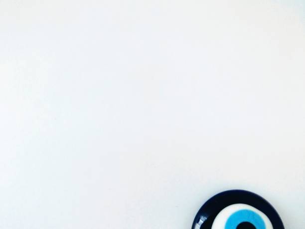 istock Good luuk eye keeping away bad karma on a white background 1195539351