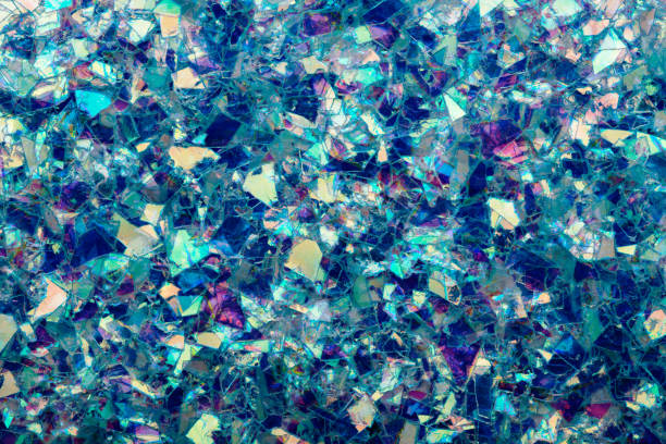 blau glühende glimmer glitzer bunte konfetti abstrakte hintergrund - mica schist stock-fotos und bilder