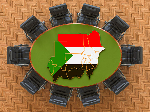 Sudanese goverment meeting. Map of Sudan on the round table, 3D rendering