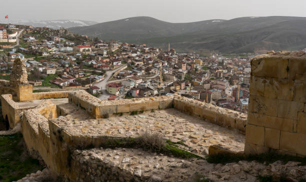 Bayburt Town Castle Turkey Bayburt, Turkey - May 6, 2019: Veiw of the town of Bayburt in Turkey with houses, flats, mosques and a castle wall. bayburt stock pictures, royalty-free photos & images