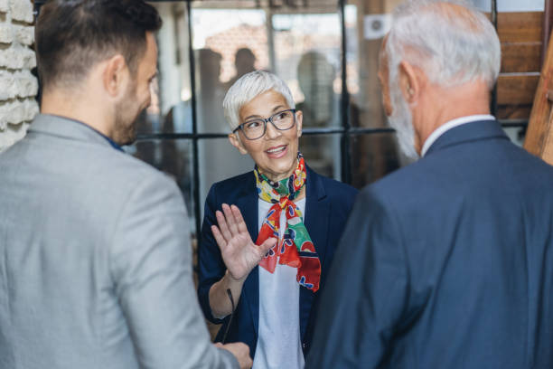 istock Business people having casual conversation 1195549153