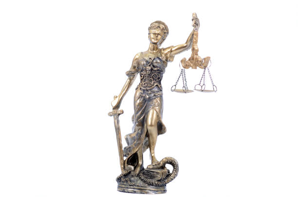 istock Lady Justice on the white isolated background 1195550726
