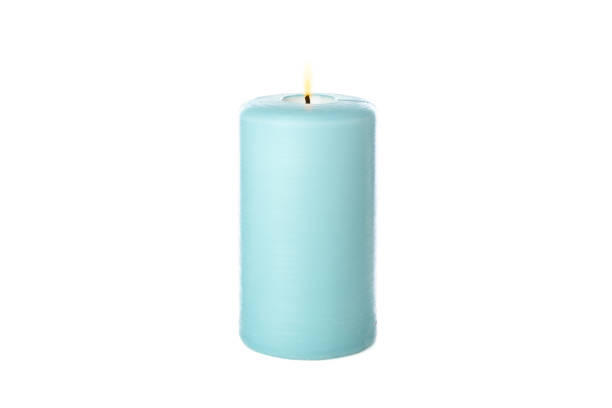 istock Blue burning candle isolated on white background 1195553567