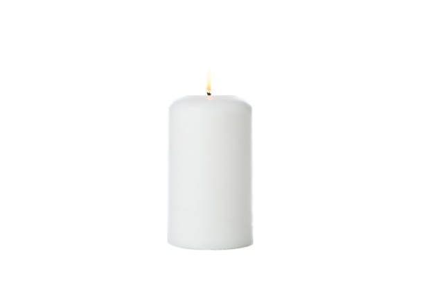 istock Glowing white candle isolated on white background 1195555663
