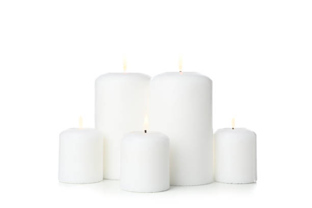 istock Group of different candles isolated on white background 1195555968