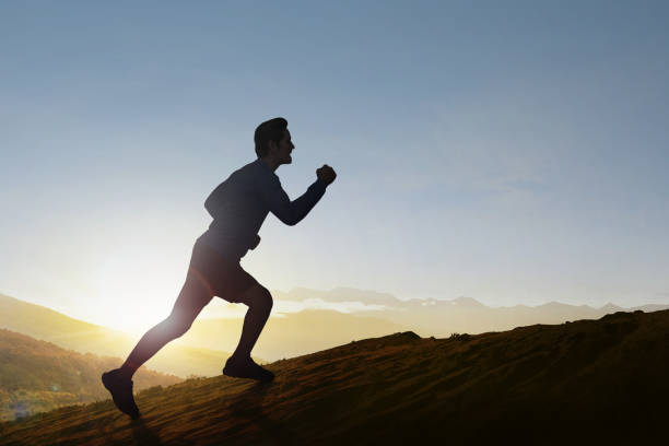 istock Asian runner man running on the mountain 1195557222