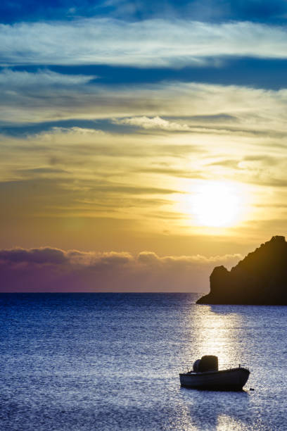 istock Sunrise or sunset over sea surface 1195557572