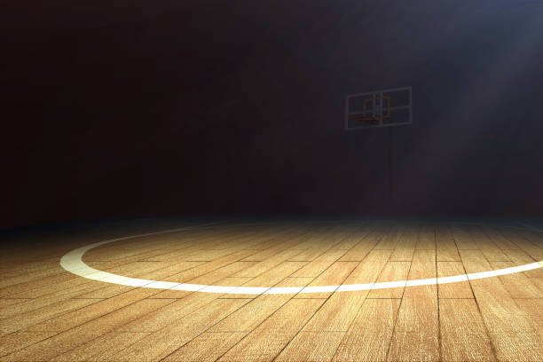 Basketball court with wooden floor and a basketball hoop Basketball court with wooden floor and a basketball hoop over dark background sports court photos stock pictures, royalty-free photos & images