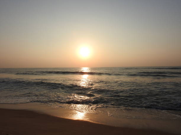 istock deep golden ocean towards beach 1195562655