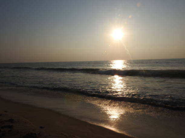 istock deep golden ocean towards beach 1195562660