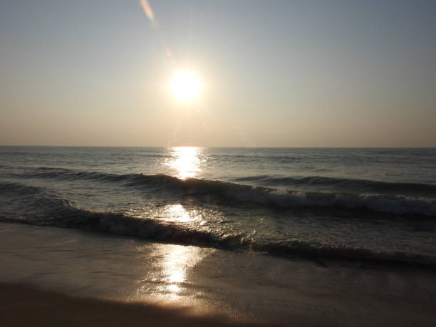 istock deep golden ocean towards beach 1195562661