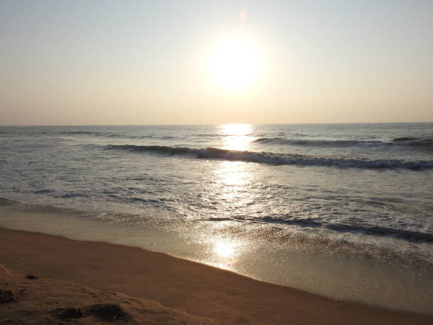 istock deep golden ocean towards beach 1195562666