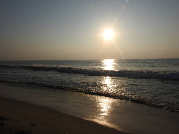 istock deep golden ocean towards beach 1195562668
