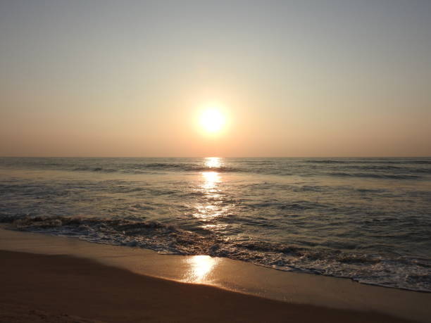 istock deep golden ocean towards beach 1195562674