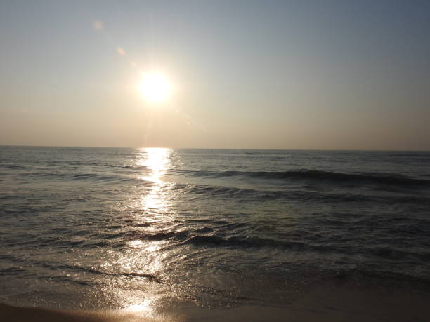 istock deep golden ocean towards beach 1195562685