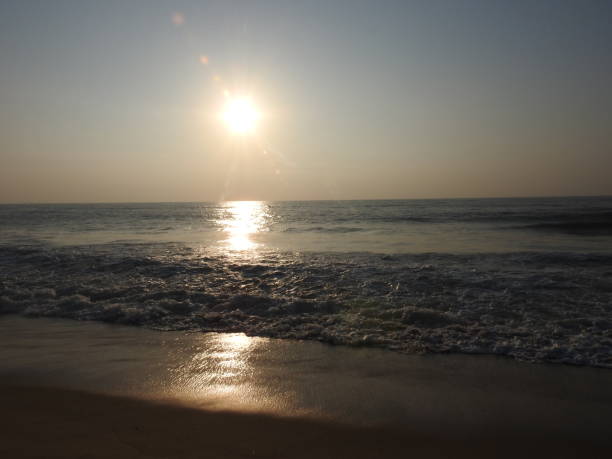 istock deep golden ocean towards beach 1195562686