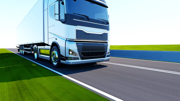 istock semi-truck with trailer driving on road 1195563785