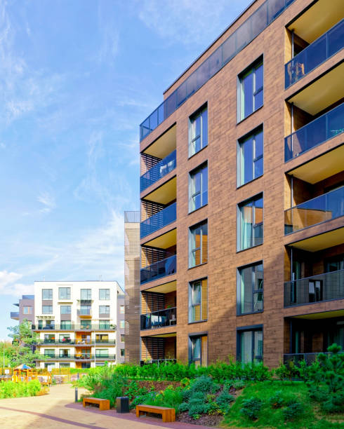 istock Benches at Modern architectural complex of apartment residential buildings reflex 1195566252