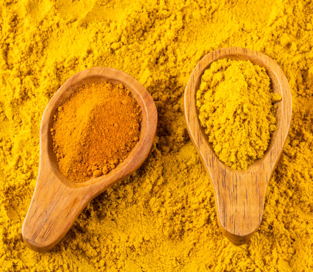 istock Dry and organic curry and turmeric powder 1195566311